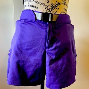 Under armor golf shorts. These are very vibrant purple size 12 and so so cute